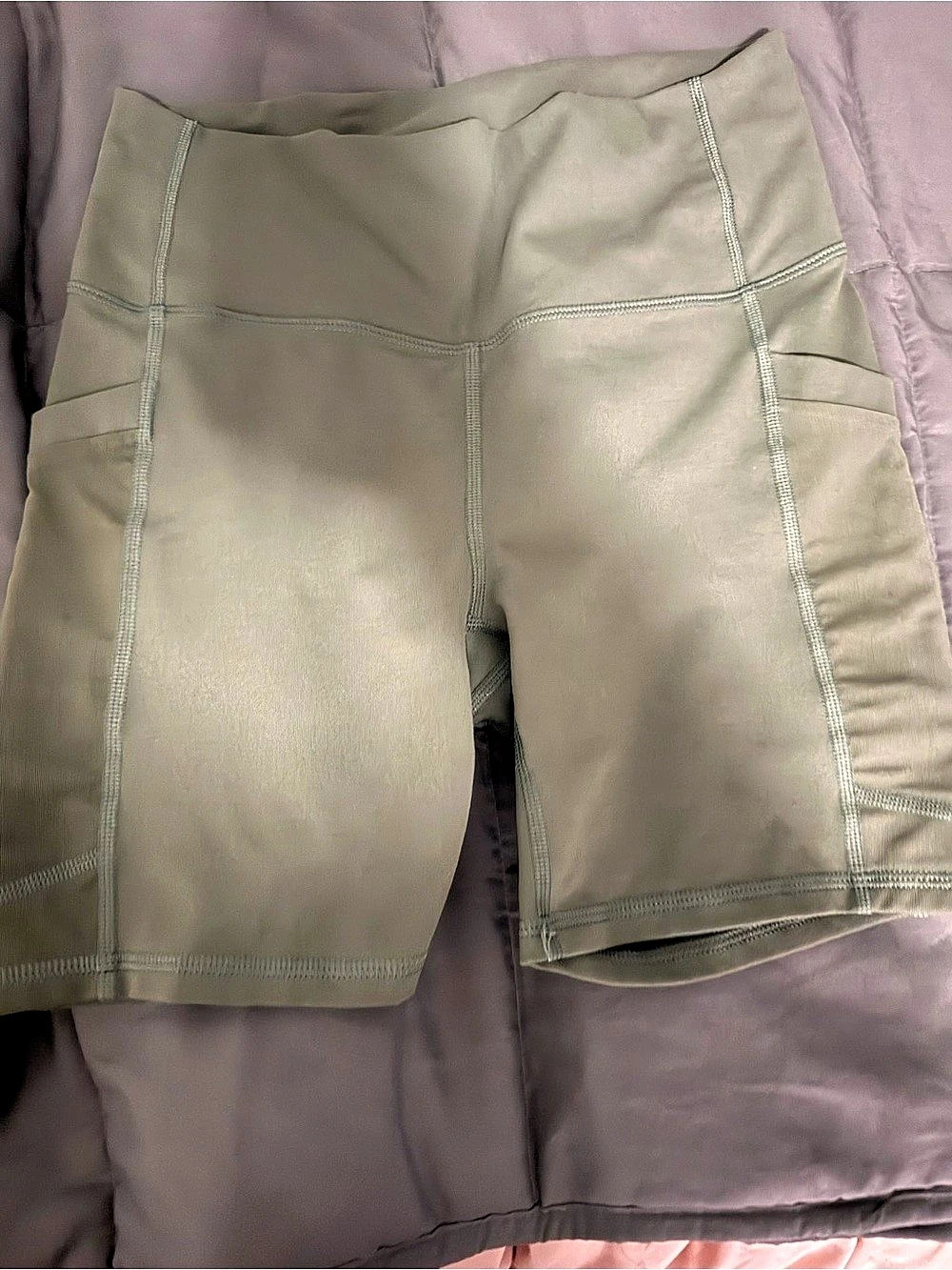 Fabletics Powerhold High Rise Bike Shorts in Green